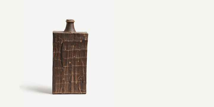 Large Faceted Slabbed Bottle with Dry Rutile Glaze